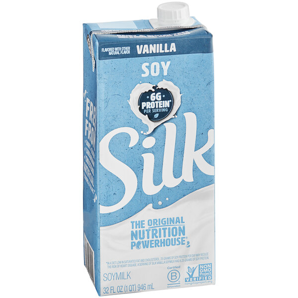 A blue and white carton of Silk Vanilla Soy Milk.