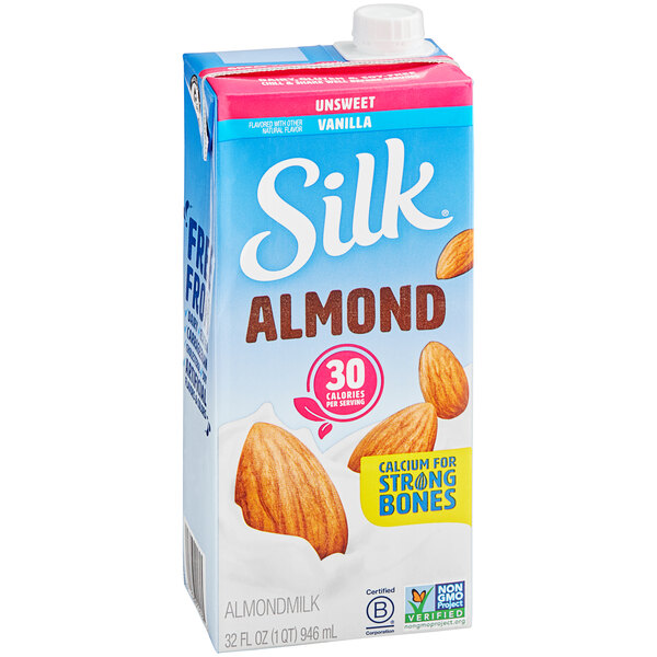 A carton of Silk Unsweetened Vanilla Almond Milk with almonds on the box.
