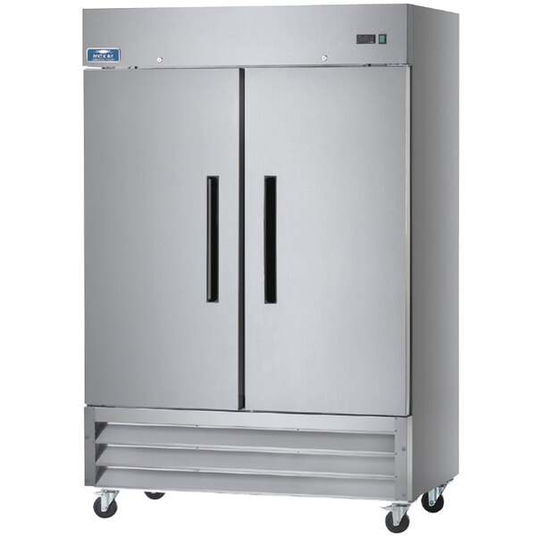 An Arctic Air two section reach-in freezer with stainless steel doors.