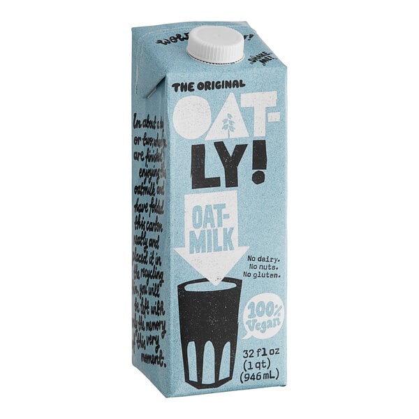 A close-up of an Oatly carton of oat milk with a white cap.