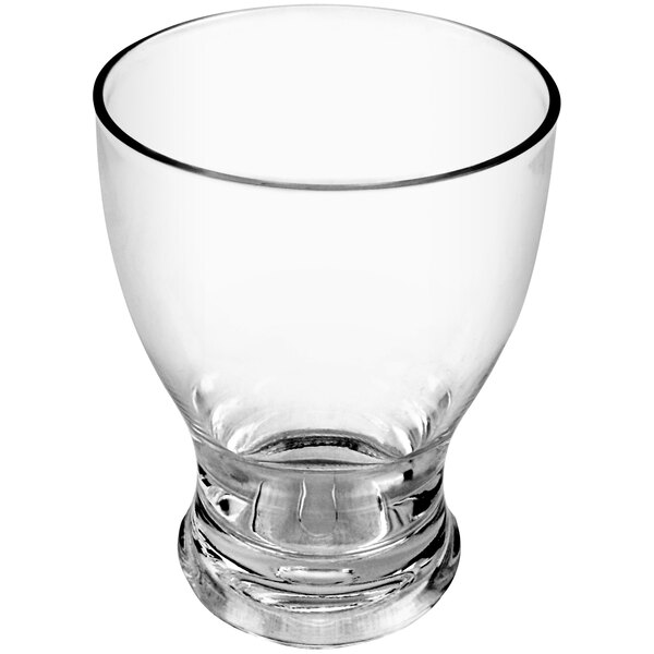 A clear plastic flared tumbler with a rim.