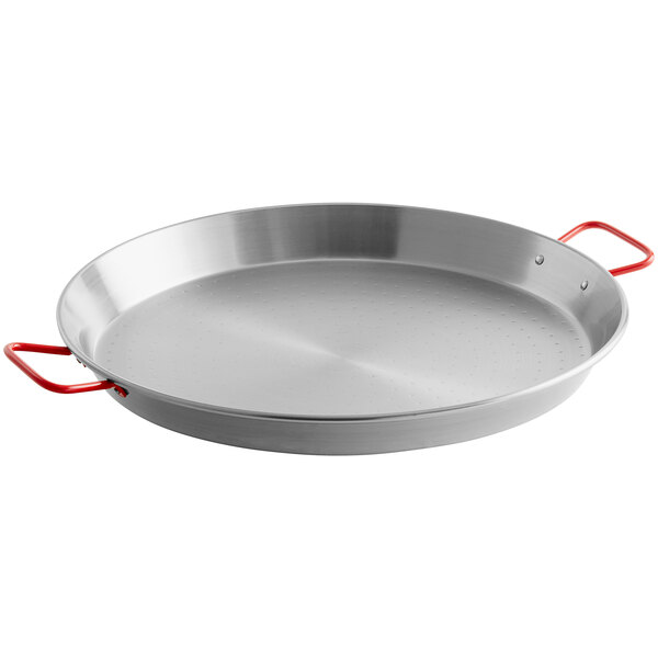 A Vigor 18" carbon steel paella pan with red handles.