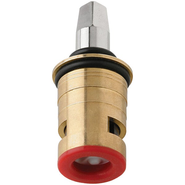 A close-up of a brass and red Chicago Faucets ceramic cartridge.