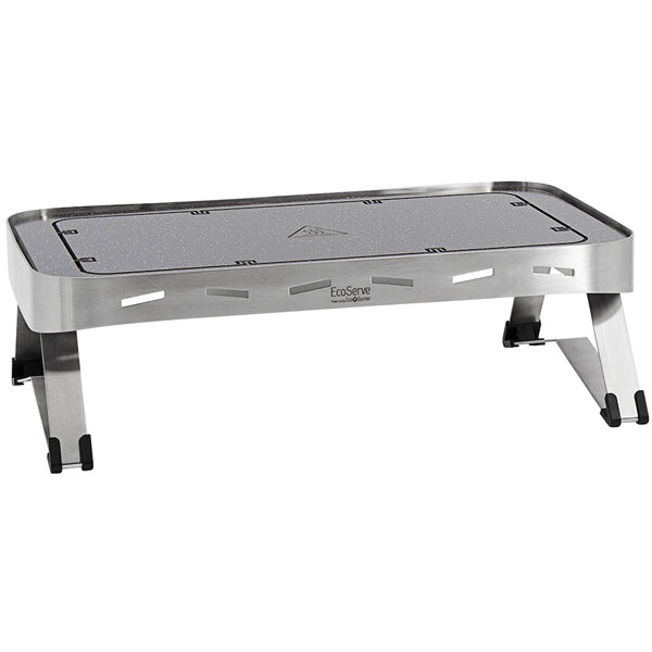 An EcoServe GN base with stainless steel legs on a table with a stainless steel tray on top.
