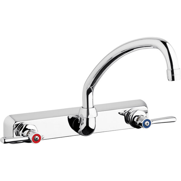 A silver Chicago Faucets wall-mounted faucet with red and silver handles.
