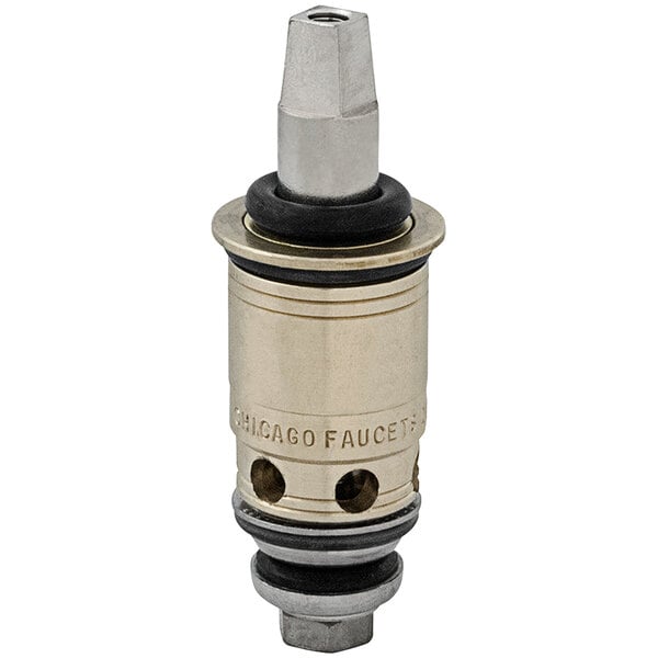 A Chicago Faucets brass Quaturn cartridge with a black and white cap.