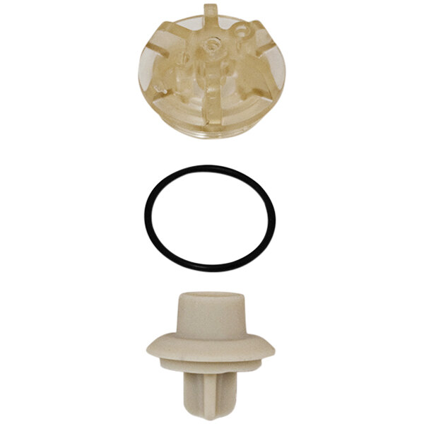 A clear plastic Chicago Faucets vacuum breaker with beige and black rubber seals.