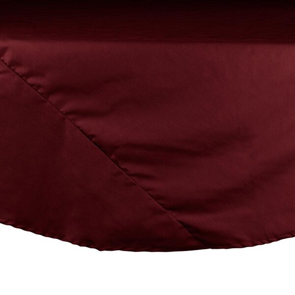 A burgundy Intedge round table cloth on a white table.