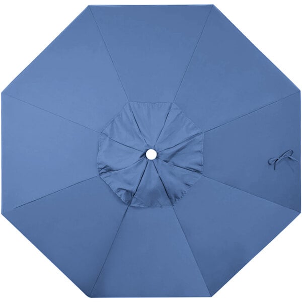 A blue fabric canopy for a California Umbrella with a white button.