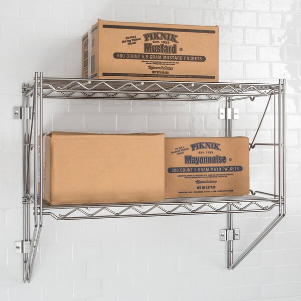 A Metro Erecta chrome wire shelf with boxes on it.
