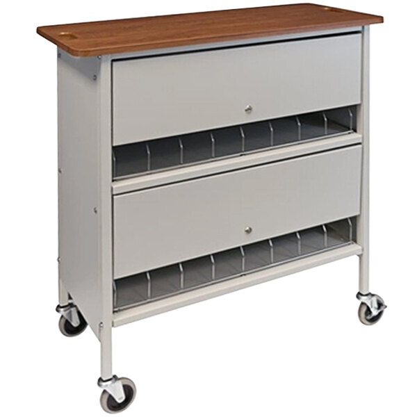 A light grey metal medical cart with a cherry wood top and white drawers.