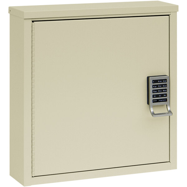 An Omnimed beige metal patient security cabinet with an e-lock.