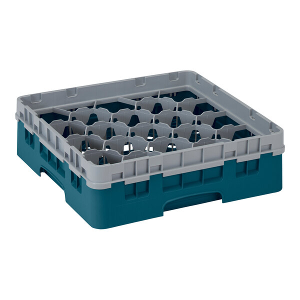 A teal plastic Cambro glass rack with 20 compartments and 1 extender.