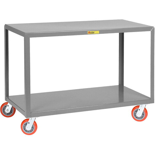 A grey steel Little Giant metal cart with orange wheels.