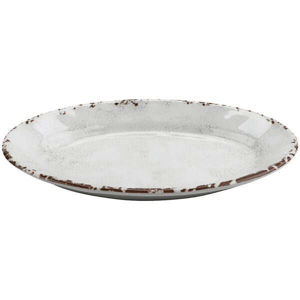 A white GET French Mill melamine platter with brown speckled edges.