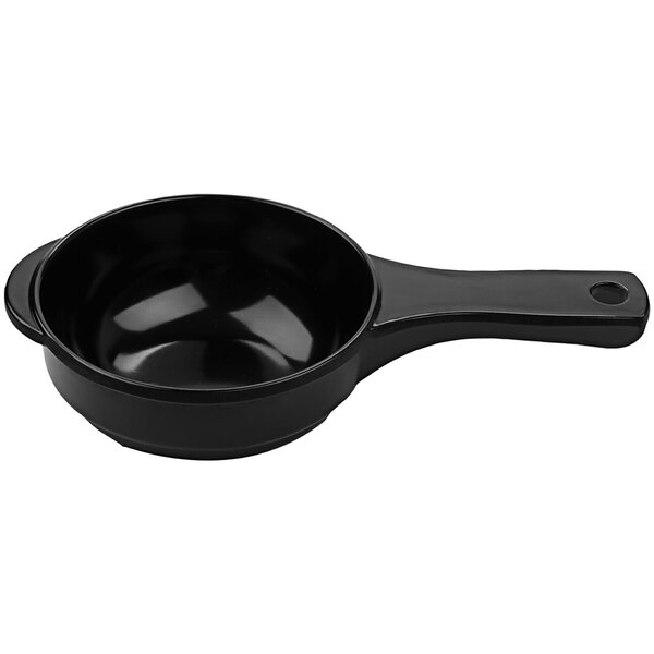 A black bowl with a handle.