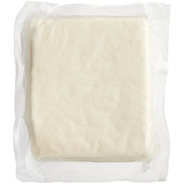 A white square of Franklin Farms Firm Tofu in a plastic package.