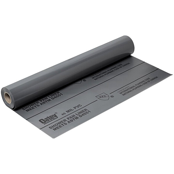 A roll of grey Oatey PVC shower pan liner.