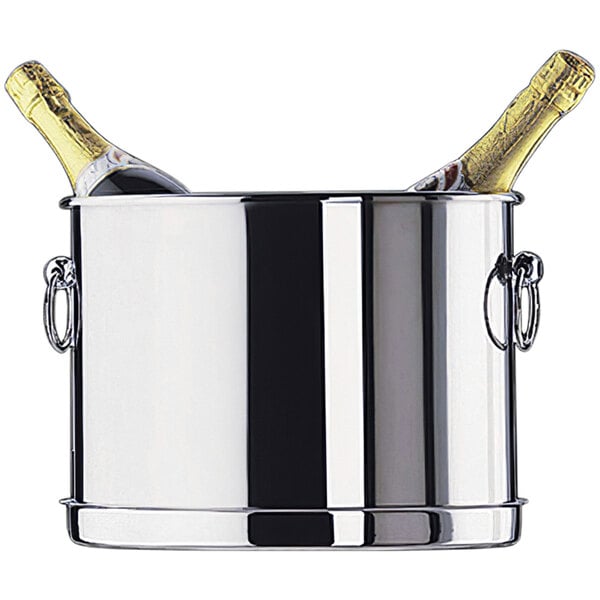 A silver Fortessa stainless steel wine bucket with two bottles of champagne inside.