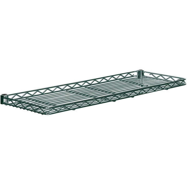 A Metro smoked glass cantilever shelf with a green metal frame.