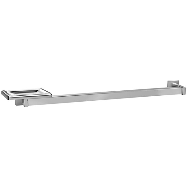 A bright stainless steel towel bar with a soap dish on it.