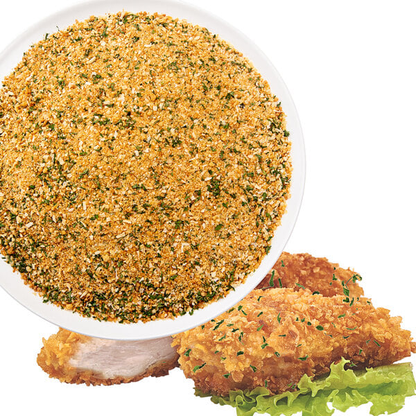 A bowl of fried chicken breaded with Katz Gluten-Free Seasoned Bread Crumbs on a white surface.