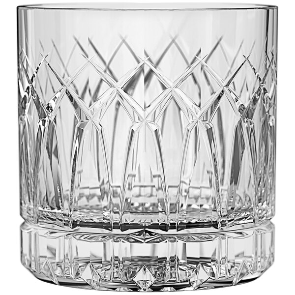 A close up of a Traze double old fashioned glass on a white background.