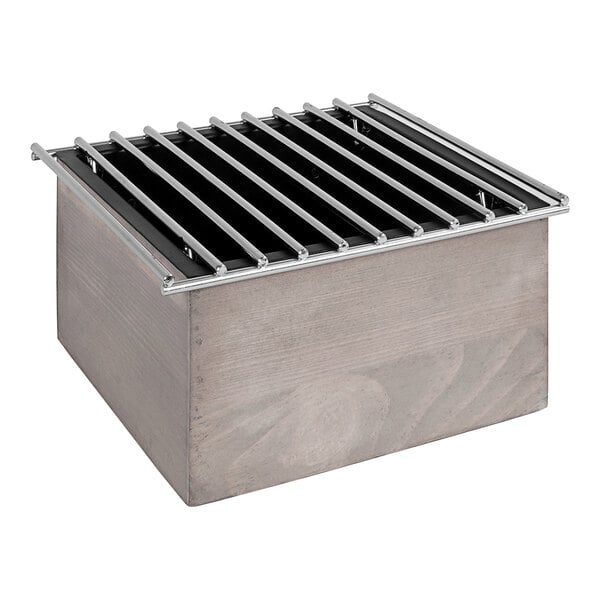 A Cal Mil gray pine chafer alternative in a wooden box with a metal grate.