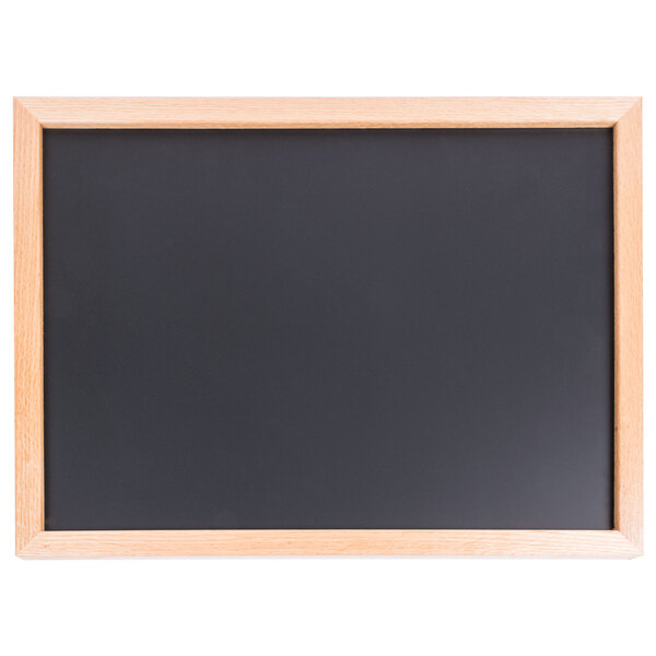 An Aarco blackboard with oak frame.