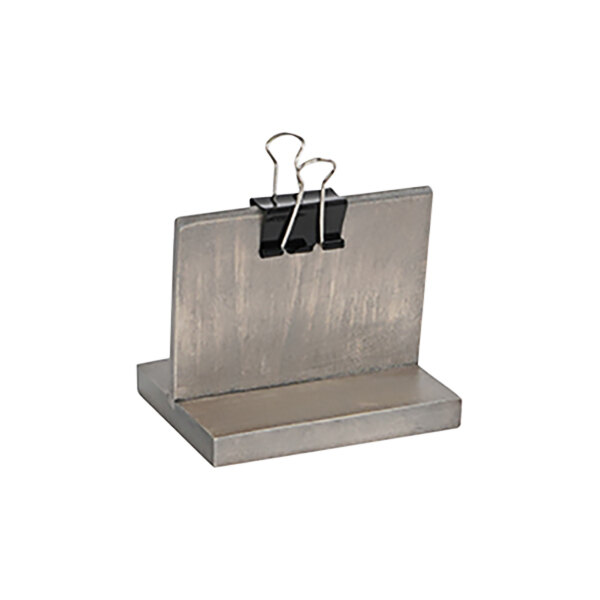 A gray pine clipboard menu holder with metal clips.