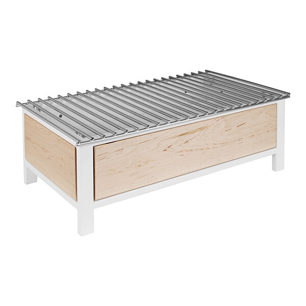 A wood and metal grill with a metal grate inside a wood box.