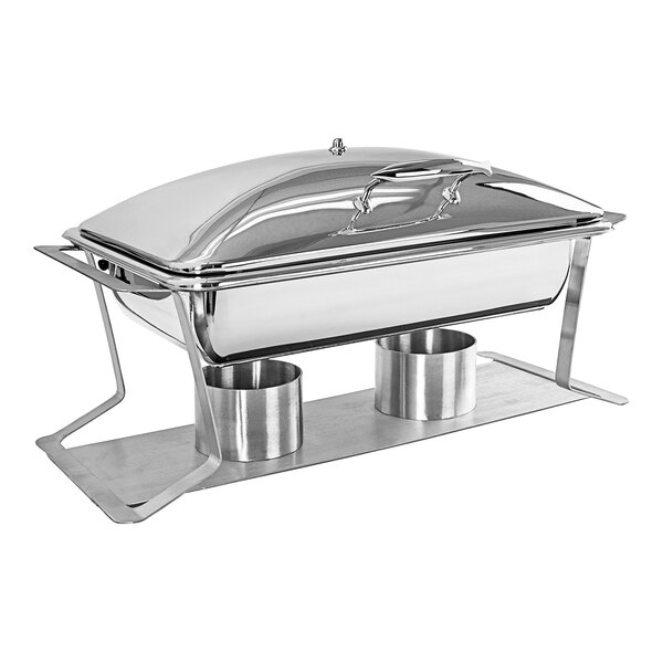 A silver stainless steel Cal-Mil chafer with a lid on a table.