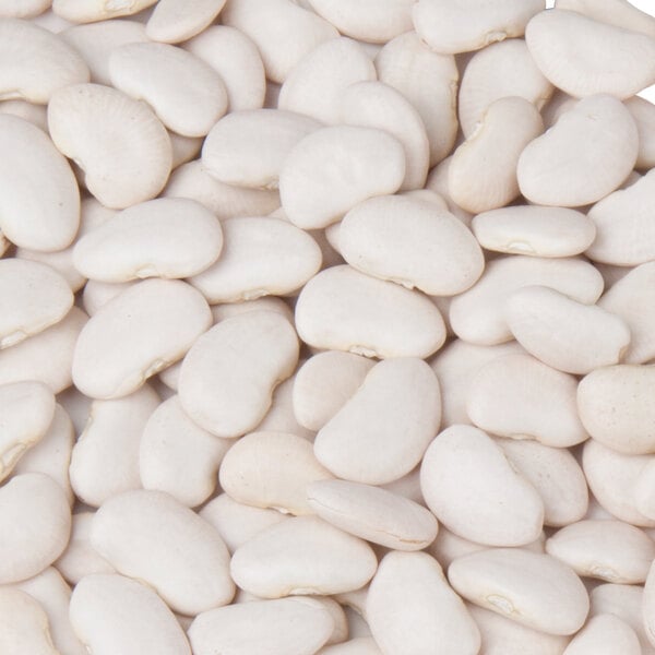 A pile of dried large lima beans.