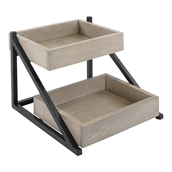 A wood and metal 2-tier shelf with 2 wooden trays on it.