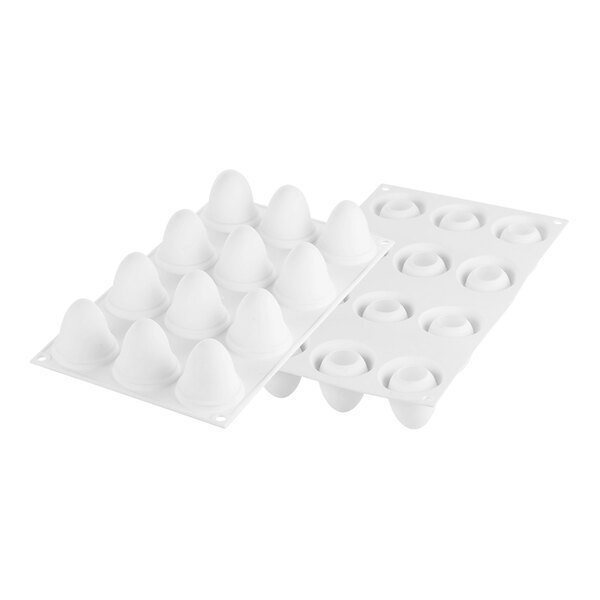 A white silicone baking mold with 12 egg-shaped cavities.