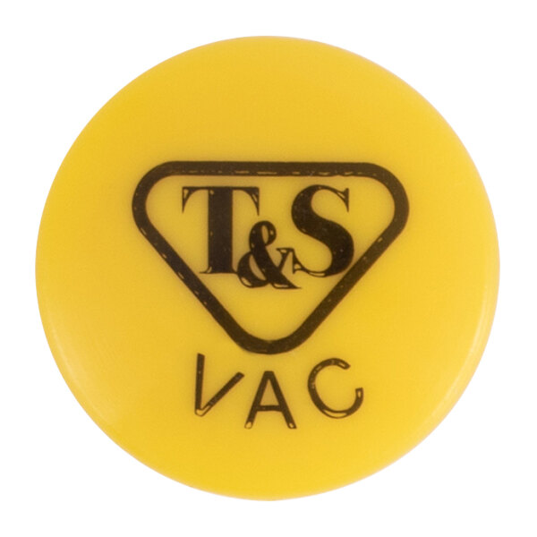 A yellow press-in button with black letters reading "VAC" and a black circle with a black "S" on it.