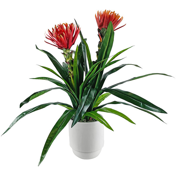 An LCG Sales artificial bromeliad plant with red flowers in a white pot.