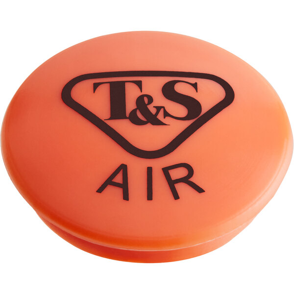 An orange T&S round press-in index with black text and a logo.