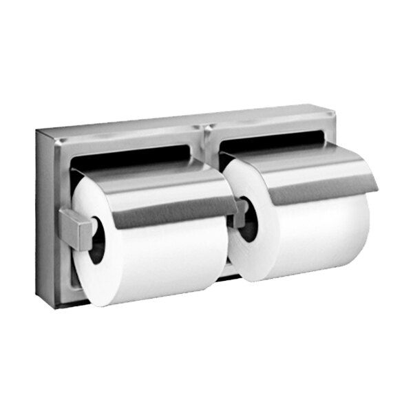 A stainless steel double roll toilet paper holder with a hood holding two rolls of toilet paper.