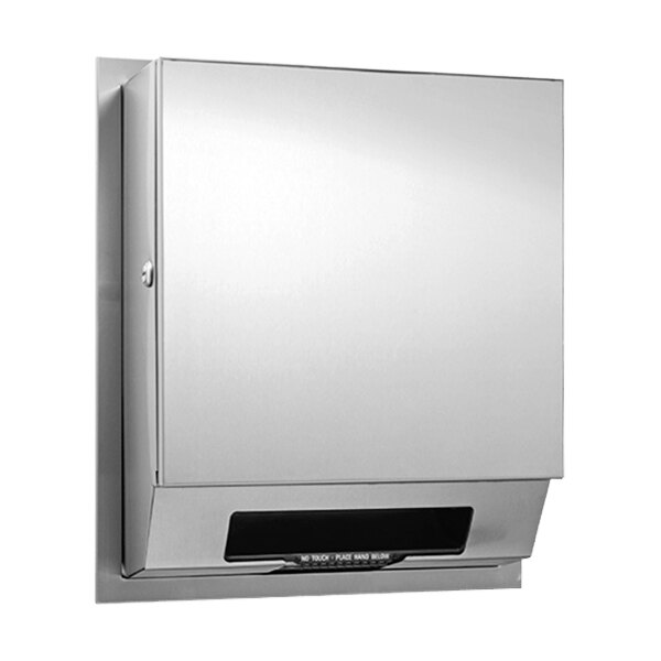An American Specialties, Inc. stainless steel automatic paper towel dispenser on a wall.