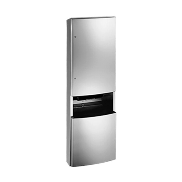 A stainless steel semi-recessed battery-operated paper towel dispenser with a door.