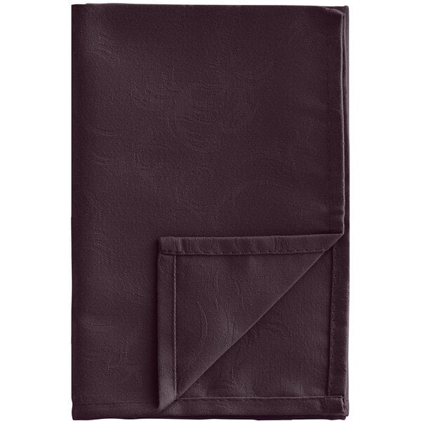 A folded chocolate brown Snap Drape Windsor Damask cloth napkin with a folded edge on a white background.