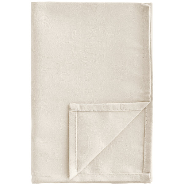 A white Snap Drape Windsor Damask cloth napkin with a stitched edge folded into a triangle.
