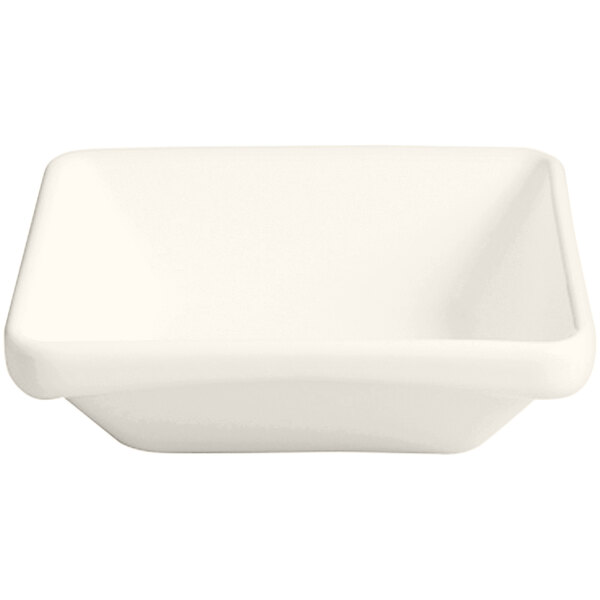 A white square RAK Porcelain bowl on a white surface.