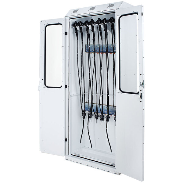 A white Harloff steel drying cabinet with black wires.