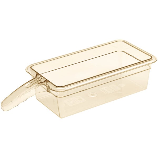 A Cambro H-Pan 1/3 size amber plastic container with a handle.
