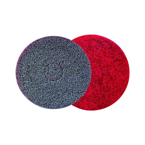 Two red and black SC Johnson Professional heavy-duty scrub floor pads with a white background.