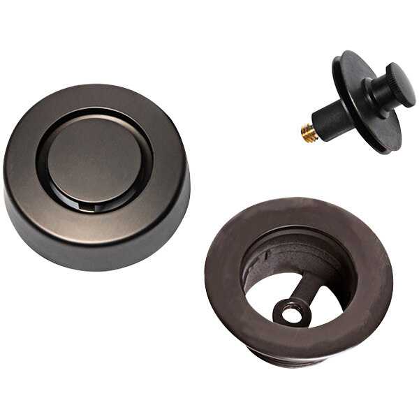 An oil rubbed bronze Dearborn push n' pull stopper with a black circular knob and a gold screw.