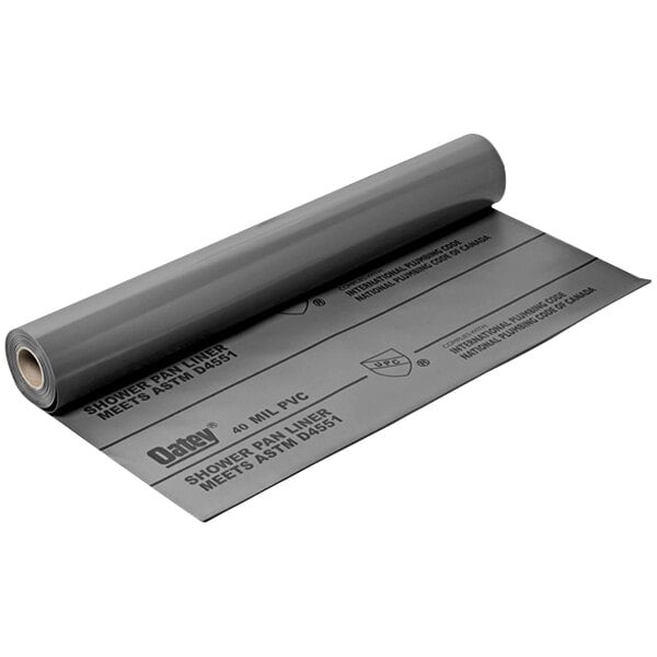 A roll of grey plastic pan liner.