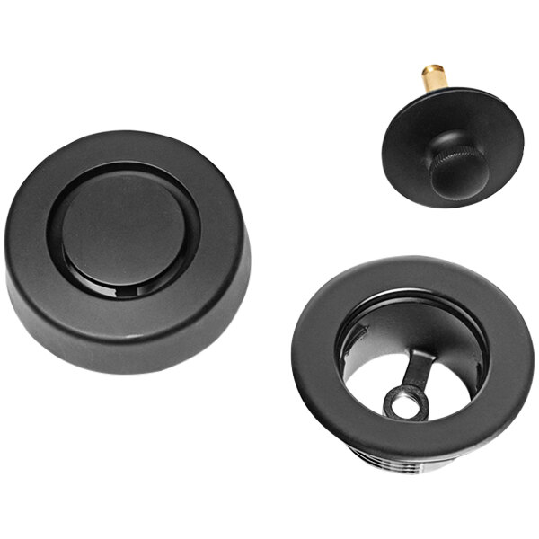 A black circular Dearborn trim kit with a round matte black center and gold accents.